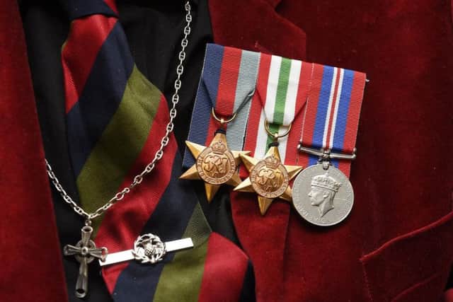 Service: Mr Barnetson wore his medals proudly for the launch of the flim