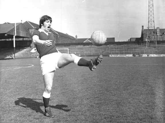 Bobby Prentice plays keepy-uppy during a training session at Tynecastle in 1976. Picture: Stan Warburton