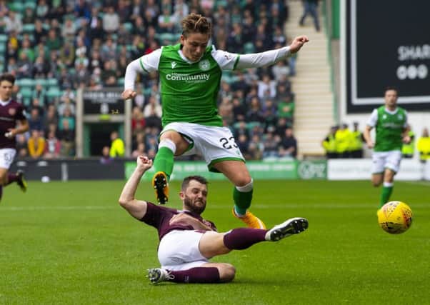 Scott Allan is foiled by Craig Halkett. Allan was by far the more creative Hibs player but his influence waned as the match wore on