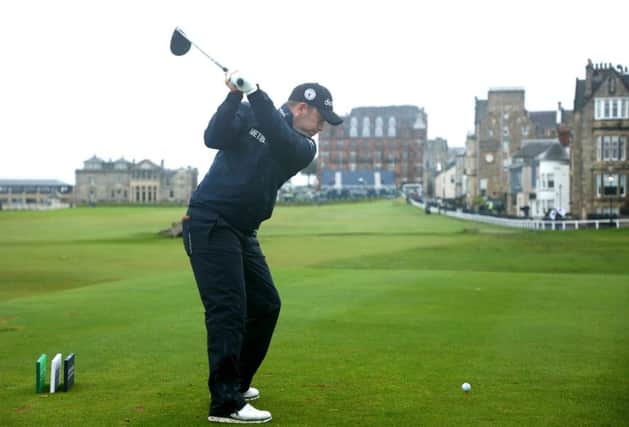 Richie Ramsay tees off on the 18th hole on the Old Course at St Andrews