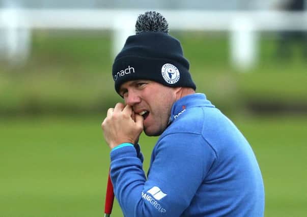 Richie Ramsay reacts after missing a putt on the 17th hole