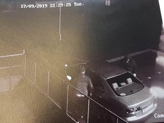 CCTV footage shows the burglars driving into the yard and filling their car up with elevator weights before taking off.