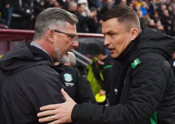 Hibs head coach Paul Heckingbottom, right, and in 
particular Hearts boss Craig Levein, are under pressure going into the derby
