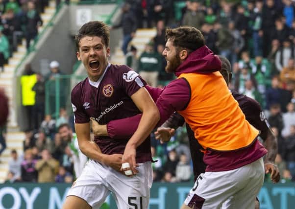 Aaron Hickey celebrates after scoring to make it 2-1in the derby against Hibernian
