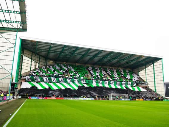 The Hibs fans with their tifo display before the game. Picture: SNS