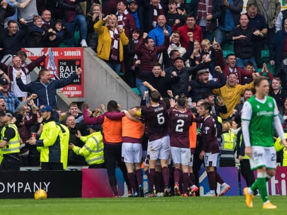 Hearts fans celebrate at Easter Road. Picture: SNS