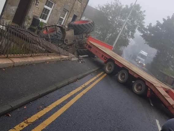 The tractor overturned into a garden on Lundin Links in Fife around 3.40 am this morning. Picture: Fife jammer locations