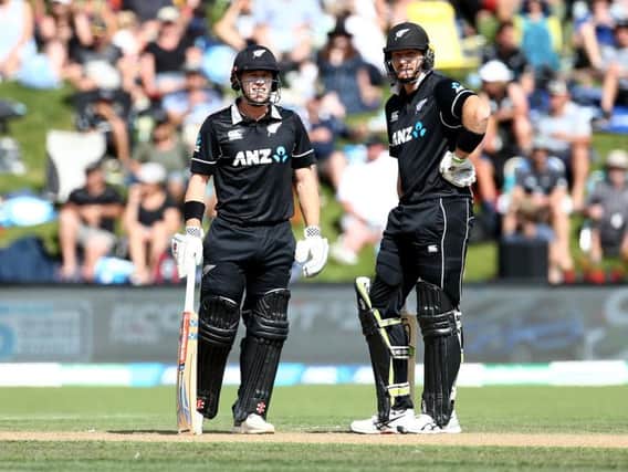 New Zealand duo Henry Nicholls and Martin Guptill look on during an ODI with Bangladesh in February 2019
