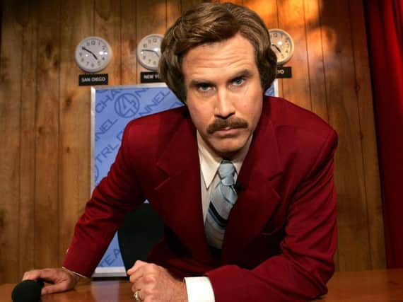 Will Ferrell as Ron Burgundy in Anchorman.