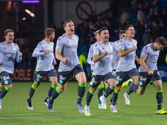The jubilation is etched on the Hibs players' faces after seeing off Kilmarnock. Picture: SNS