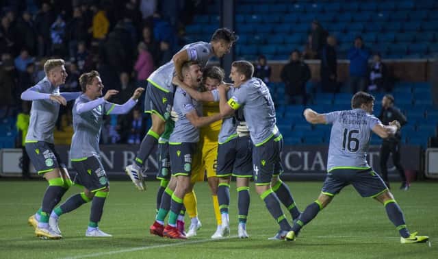 Hibs celebrate winning the penalty shoot-out
