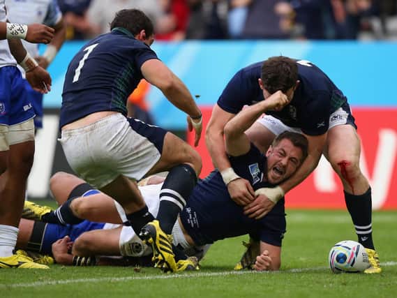 Greig Laidlaw scores the winning try for Scotland against Samoa in Newcastle four years ago to seal a quarter-final place after a tense 36-33 victory. Picture: Getty Images