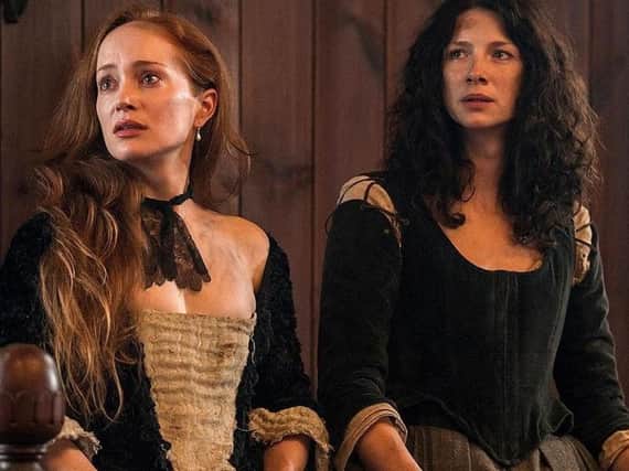 The fictional Geillis Duncan (left) appeared in the dock accused of witchcraft in Outlander. Picture: Outlander/Starz