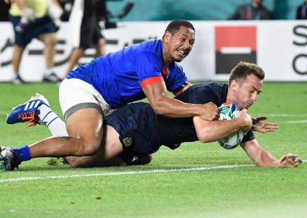 Greg Laidlaw scores his try against Samoa. Picture: AFP/Getty