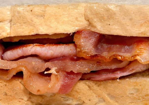 Processed red meat like bacon has been linked to cancer and other potentially deadly diseases, but a major new study suggests the effect may only be small. Picture: PA