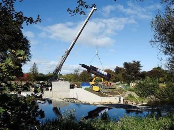 The giant Archimedes screw was hoisted into place in Saughton Park today. Pic: Edinburgh City Council