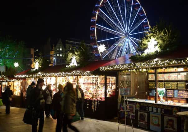 Edinburgh's Christmas market draws spending away from local businesses, says Kevin Buckle. Picture: Phil Wilkinson