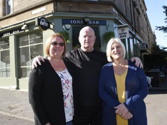 Jim and Jackie Colvine with their great friend Tracy who has been working at the pub for 30 years