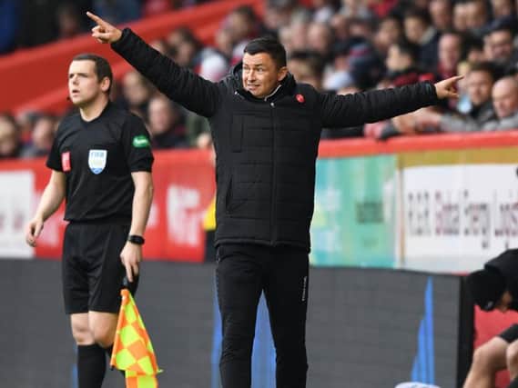 Hibs boss PLaul lHeckingbottom passes on instructions to his players at Pittodrie this afternoon. Pic: SNS