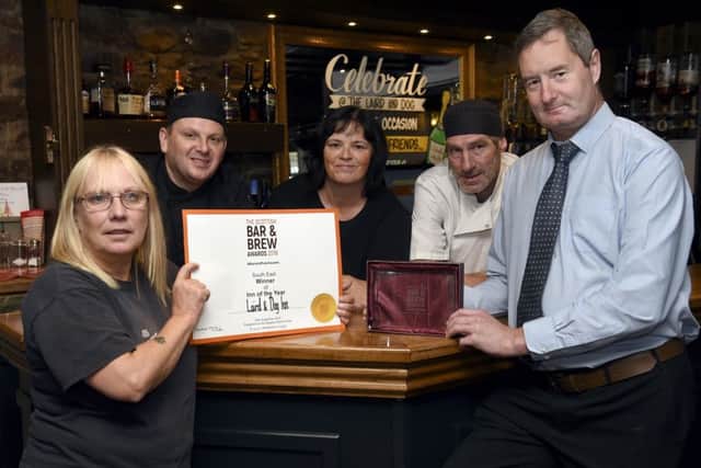 Pic Lisa Ferguson 07/10/2019



The Laird and Dog has won team of the year at the Scottish Bar and Brew Awards, contact is manager Adam Bolton


Pamela Philip  (blonde), Colin Furness (black hat), Sharon MacNab (black tshirt), David Cameron (white hat), manager Adam Bolton