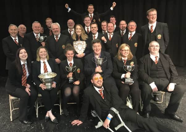Newtongrange Silver Band, pictured at the Northern Counties Brass Band Contest in May with six trophies.