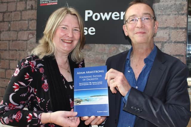 Shellie Cummings at Scotland Mining museum with curator David Bell, donating the book on Adam Armstrong