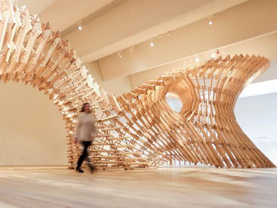 V&A Dundee's new installation is made out of more than 2000 spruce planks and beech dowels.
