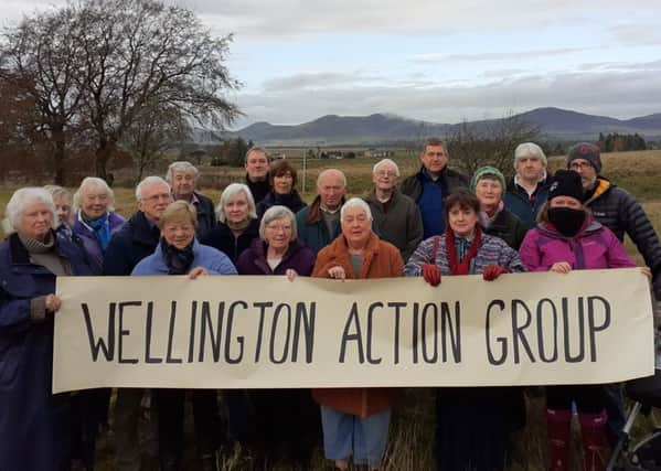 Members of the Wellington Action Group, at the site of the former Wellington School in Penicuik.