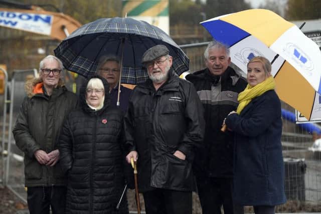 David Adam (local historian),and  community councillors Annabel Hamilton, Gina Temple, Pat Kenny and Charles Hamilton, with Midlothian councillor Kelly Parry,  at the site to be called Canmore Court, next to St Margarets Church. Photo by Lisa Ferguson.