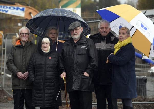 David Adam (local historian),and  community councillors Annabel Hamilton, Gina Temple, Pat Kenny and Charles Hamilton, with Midlothian councillor Kelly Parry,  at the site to be called Canmore Court, next to St Margarets Church. Photo by Lisa Ferguson.