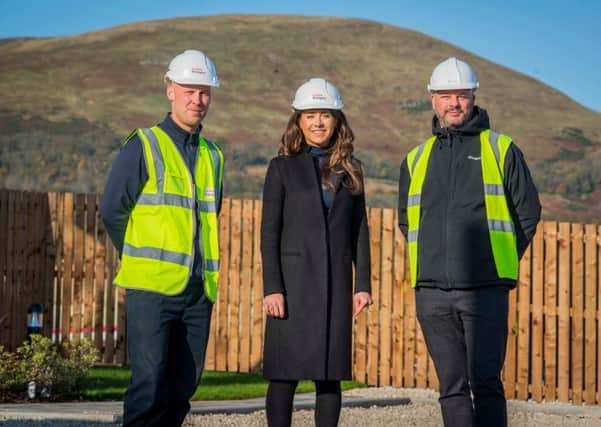 David Loney, Site Manager (Taylor Wimpey Bilston Affordable), Abby Kelman, Land Manager for Taylor Wimpey East Scotland and Neil Edgar, Development Manager for Melville. Picture Copyright Chris Watt