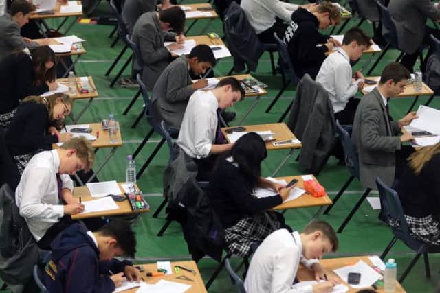 Students pictured sitting mock exams