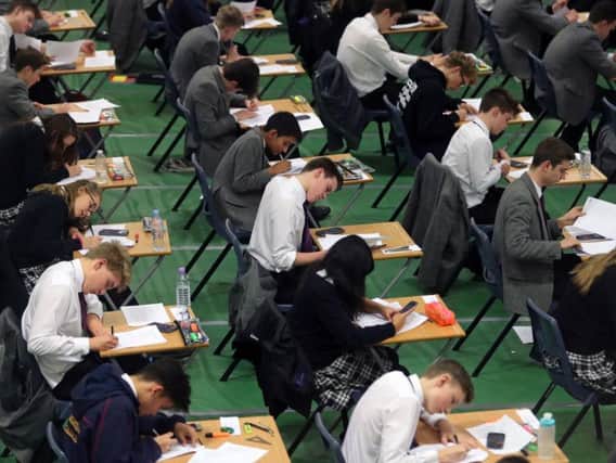 Students pictured sitting mock exams