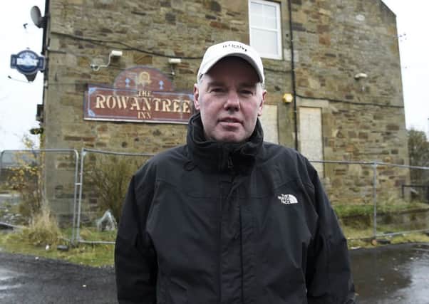 Pic Lisa Ferguson  12/11/2019


Robert Hogg chairman of Mayfield and Easthouse Community Council outside the old Rowantree pub in Mayfield.