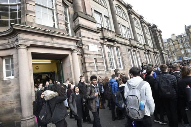 Pupils leave the old Boroughmuir High School for the last time in February 2018. Picture: Greg Macvean