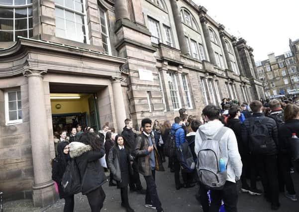 Pupils leave the old Boroughmuir High School for the last time in February 2018. Picture: Greg Macvean