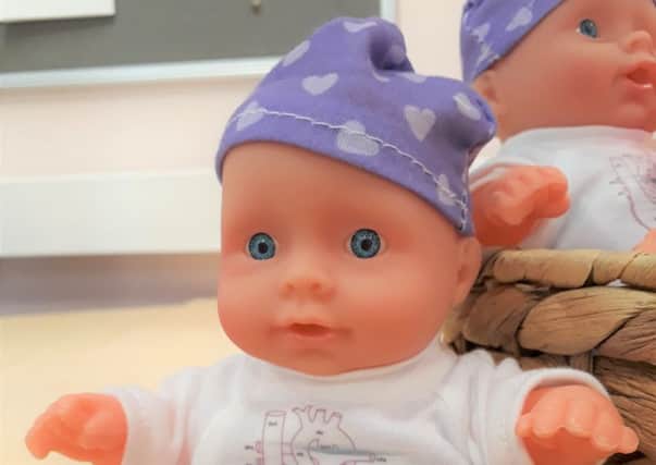 Tiny Tickers charity teaching doll shows health care professionals where to scan the heart to diagnose heart defects.
