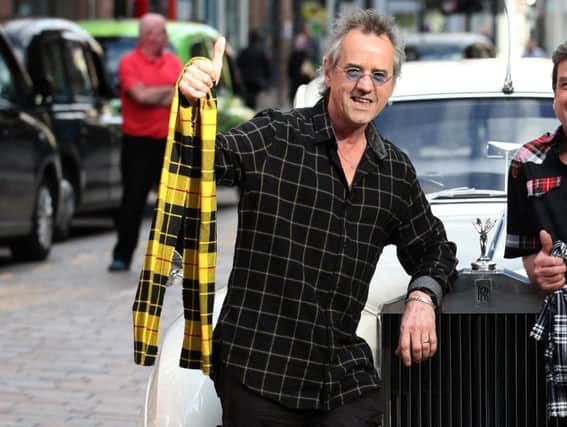 Bay City Rollers star Stuart 'Woody' Wood was the hero after he reunited lost pooch Kruger with his family.