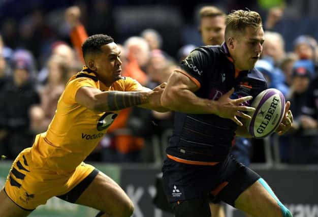 Edinburgh winger Duhan van der Merwe races for the line as he scores the opening try of the game chased by Zach Kibirige of Wasps. Picture: Mark Runnacles/Getty Images