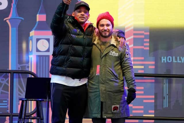 Will Smith (L) and World's Big Sleep Out Founder Josh Littlejohn speak onstage during the The World's Big Sleep Out at Times Square in New York City. Picture: Jemal Countess/Getty Images for The World's Big Sleep Out