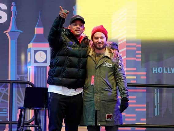 Will Smith (L) and World's Big Sleep Out Founder Josh Littlejohn speak onstage during the The World's Big Sleep Out at Times Square in New York City. Picture: Jemal Countess/Getty Images for The World's Big Sleep Out