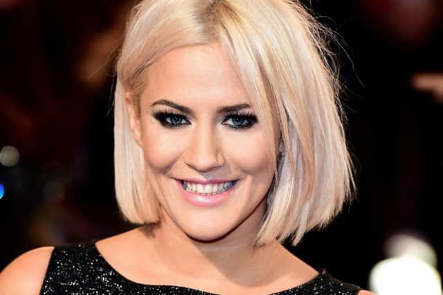 Caroline Flack's boyfriend Lewis Burton has said that his "heart is broken" following the death of the TV presenter. Picture: PA
