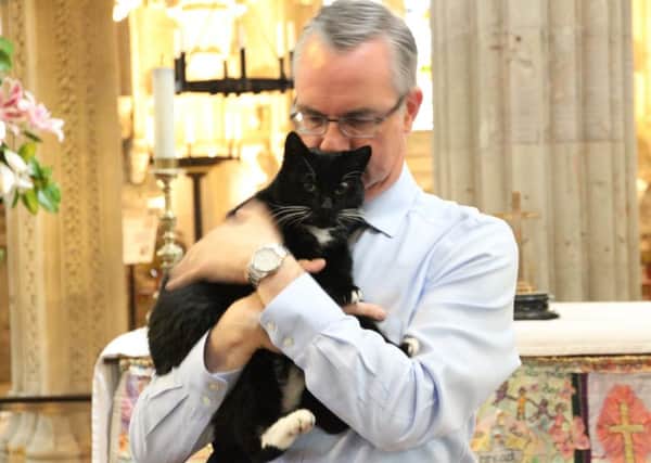 Ian Gardner, director, Rosslyn Chapel Trust, with William the Cat.
