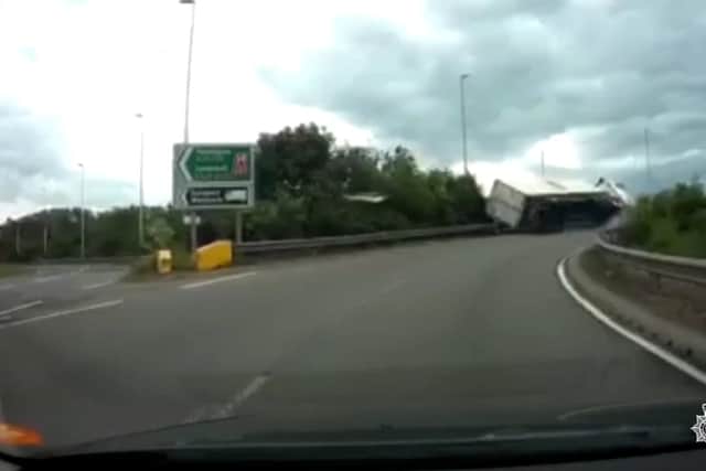 Shocking dashcam footage shows moment lorry tips on its side on bridge ...