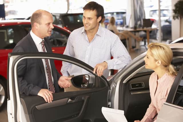 Buying from a used car dealer can be more expensive than buying privately but offers a greater level of protection (Photo: Shutterstock)