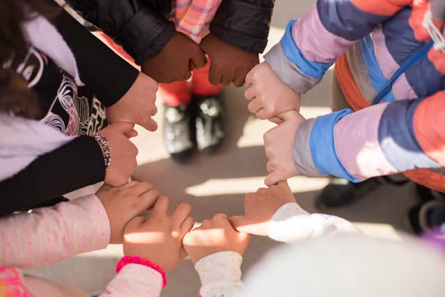 A third of children have heard racist abuse at school - here's how to talk to your child about race issues (Photo: Shutterstock)